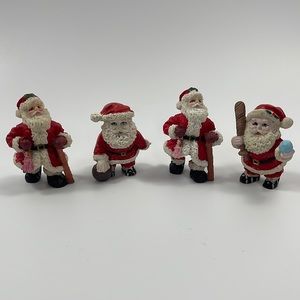 “Vintage” set of 4 Santas